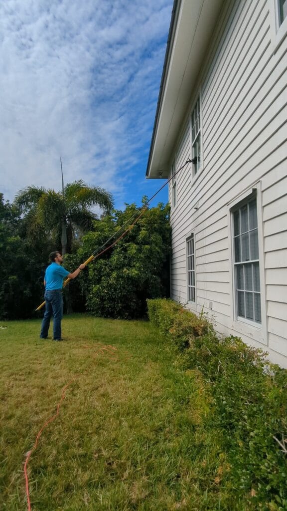 Man doing Second Story window washing