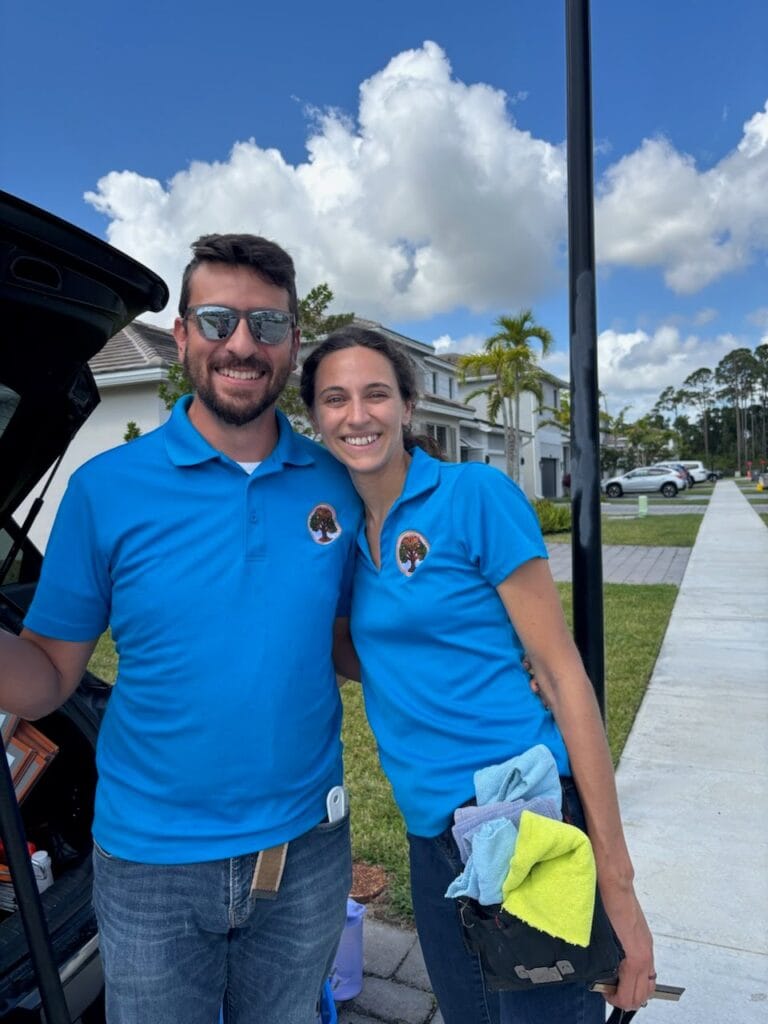 Man and Woman who are window washers and gutter cleaners