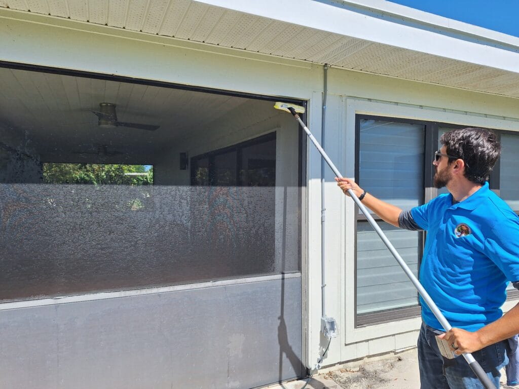 Laurel Oak cleaning a screened lanai in Palm Beach Gardens